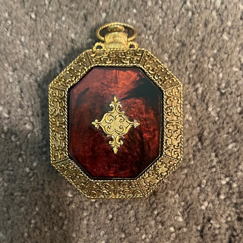 Elegant Gold and Red Ornate Home Accent
